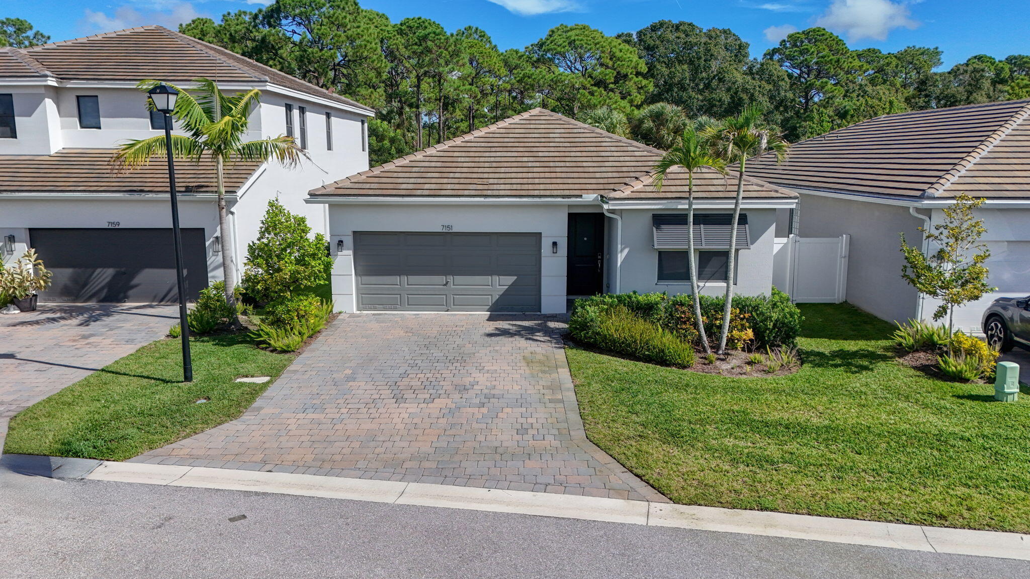 7151 Rockwood Road Jupiter, FL 33458 - Photo 4 of 74 53-web-or-mls-DJI_20260910224142_0544_D-