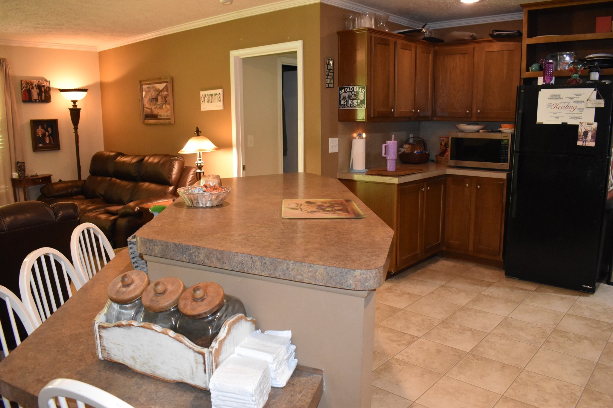 1423 Pack Road White Bluff, TN 37187 - Photo 13 of 50 a kitchen with stainless steel appliances kitchen island granite countertop a refrigerator a stove a sink and dishwasher