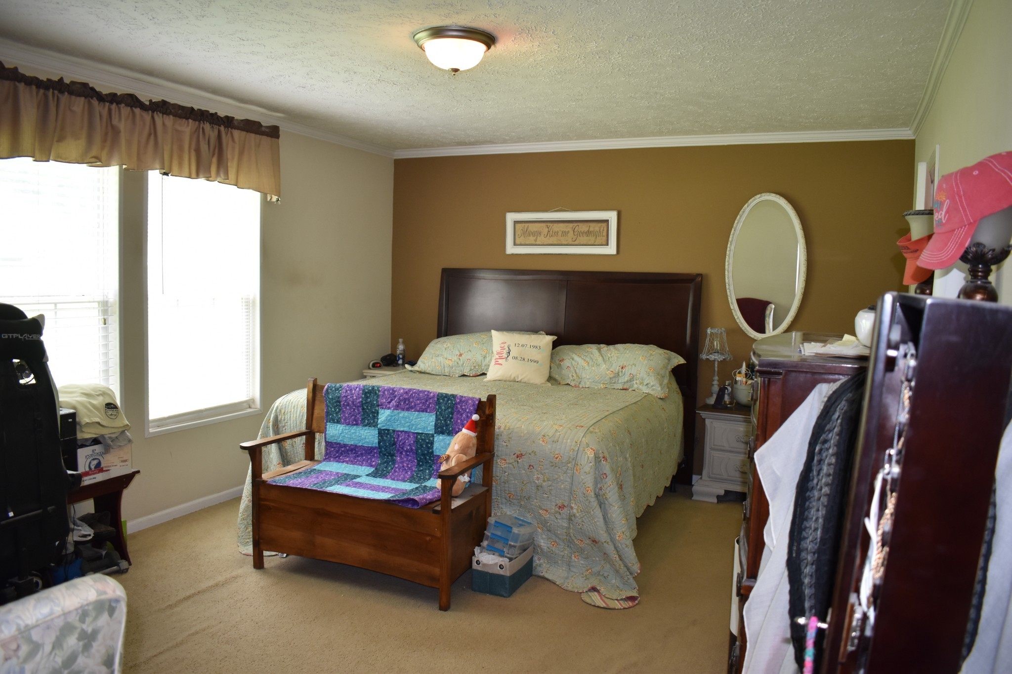 1423 Pack Road White Bluff, TN 37187 - Photo 17 of 50 a bedroom with a bed a mirror and a large window