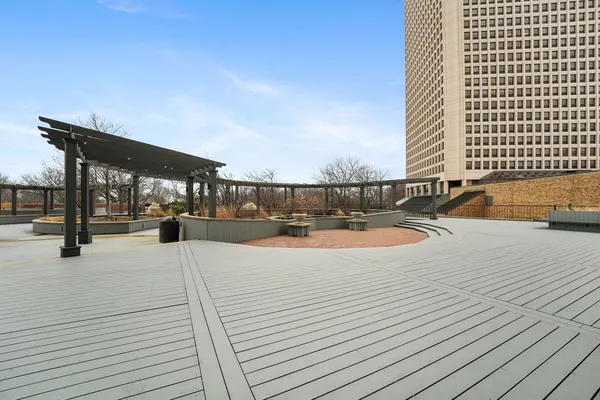 a view of swimming pool with outdoor seating