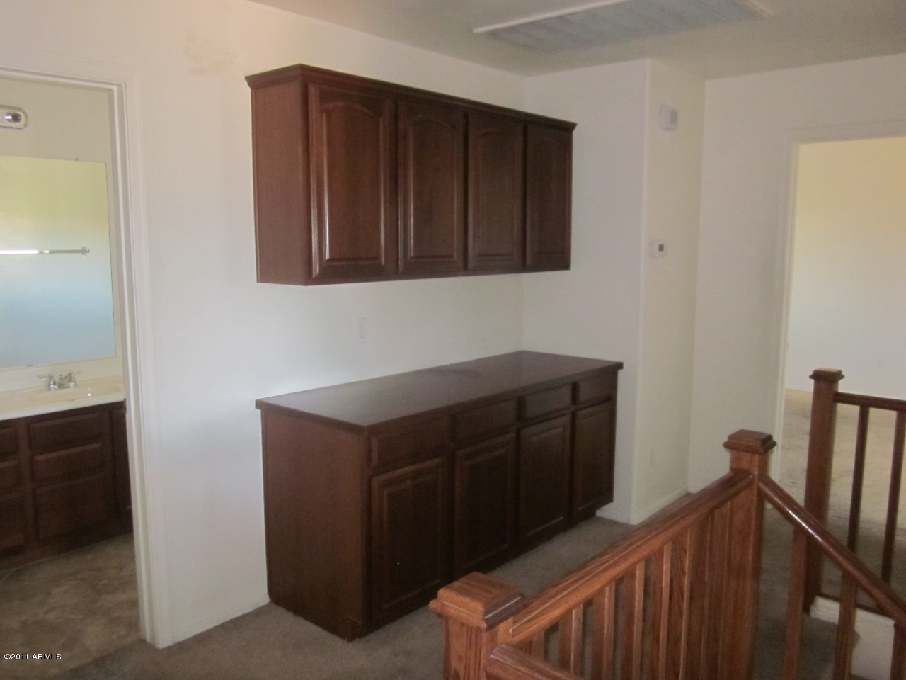4833 West Maldonado Road Laveen, AZ 85339 - Photo 6 of 9 Upstairs additional storage