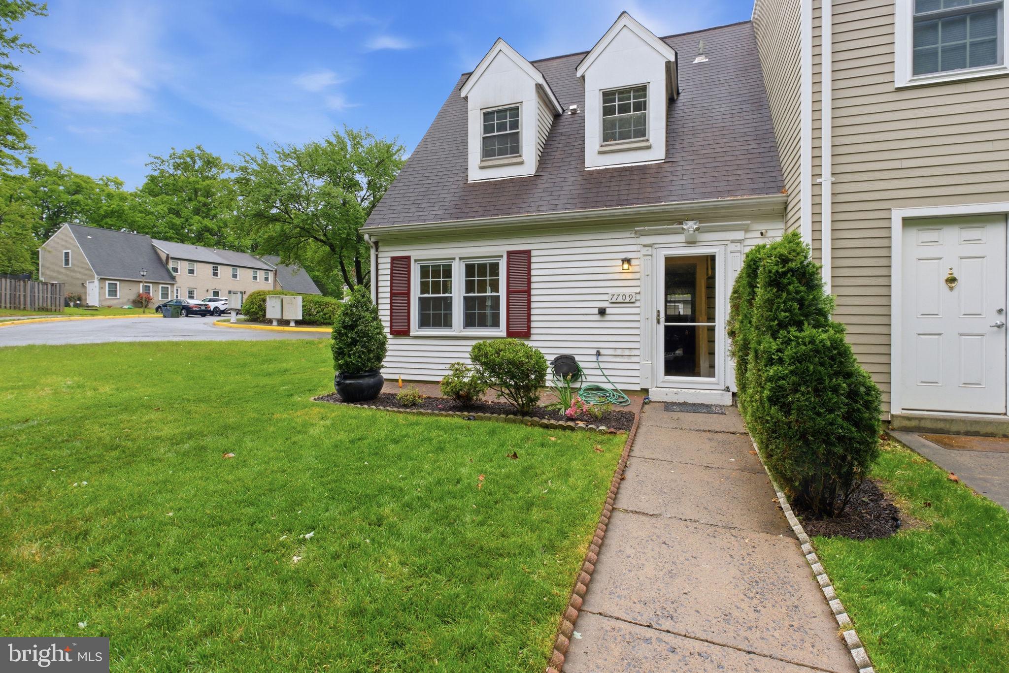 7709 Matisse Way Springfield, VA 22153 - Photo 1 of 27 End-unit townhome with wrap-around green.