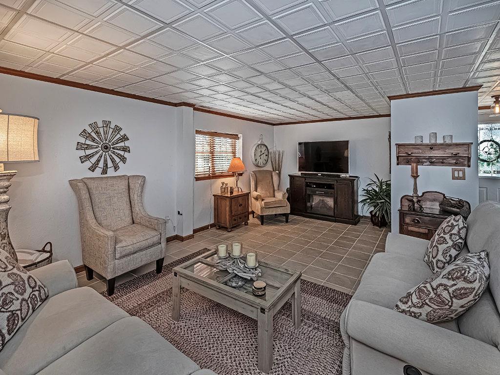 638 Knoll Lane Apollo, PA 15613 - Photo 21 of 30 a living room with furniture a flat screen tv and a couch