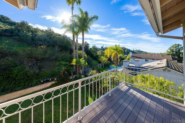 a view of a balcony with lake view