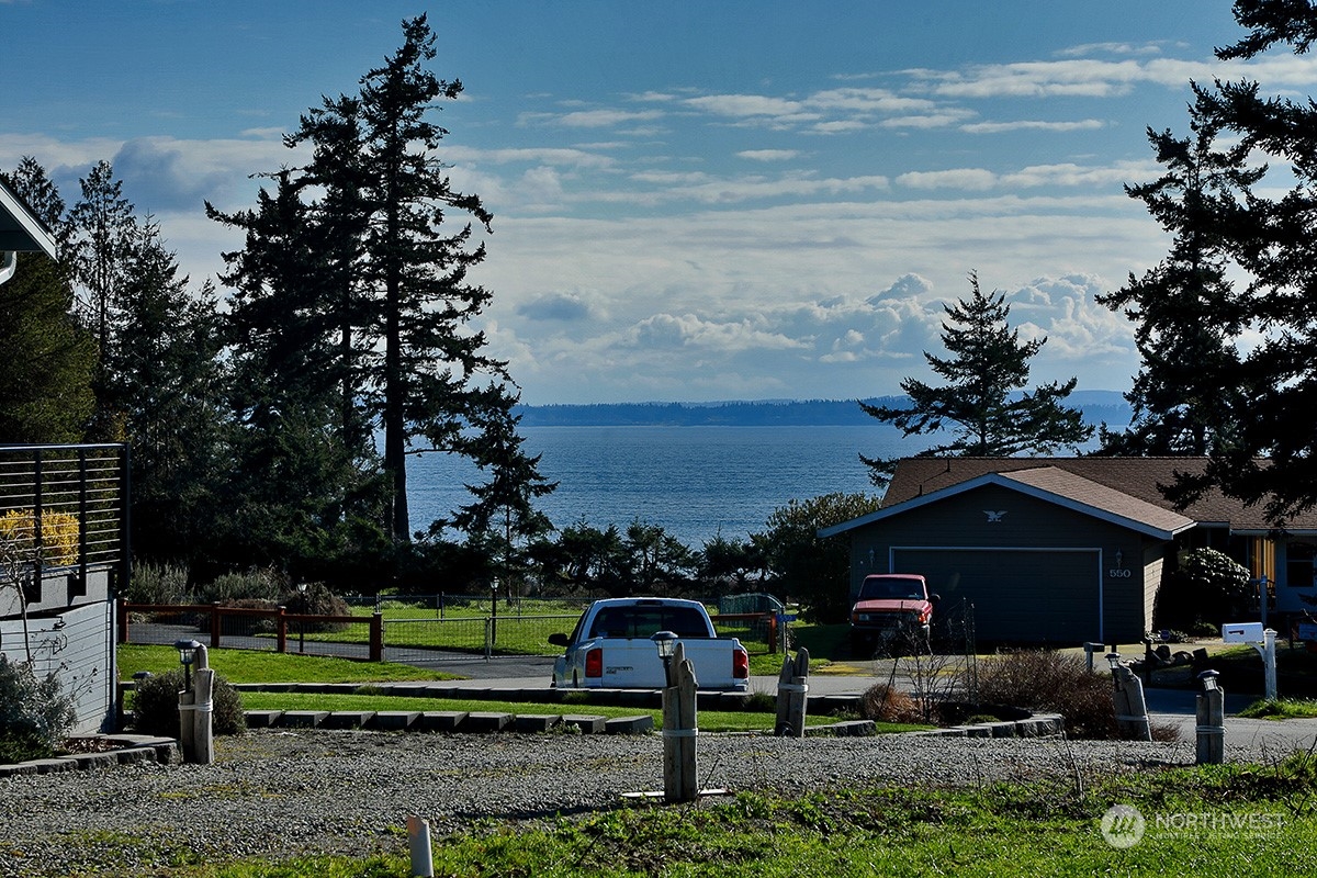0 Dolphin Drive Freeland, WA 98249 - Photo 6 of 19 a backyard of a house with lots of green space