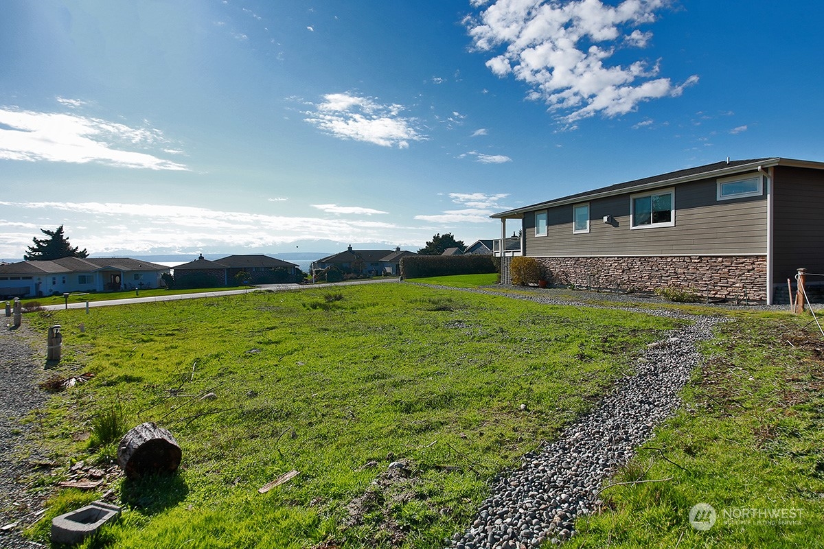 0 Dolphin Drive Freeland, WA 98249 - Photo 8 of 19 a view of a house with a yard