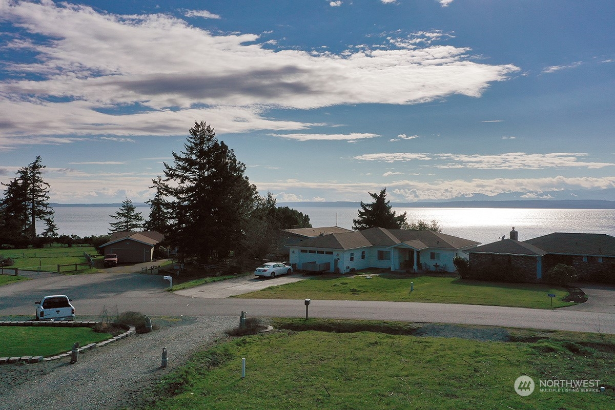 0 Dolphin Drive Freeland, WA 98249 - Photo 10 of 19 a view of a garden with lawn chairs