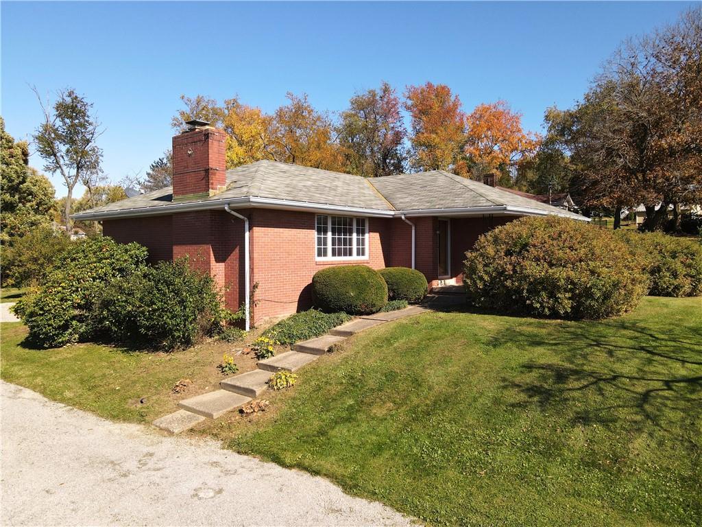 736 Beaver Street Rochester, PA 15074 - Photo 1 of 24 a front view of a house with a yard