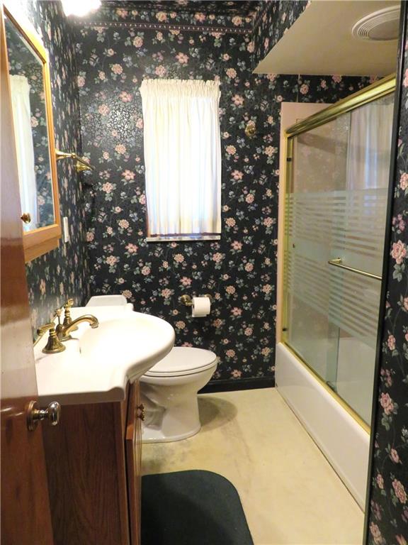 736 Beaver Street Rochester, PA 15074 - Photo 13 of 24 a bathroom with a sink toilet and shower