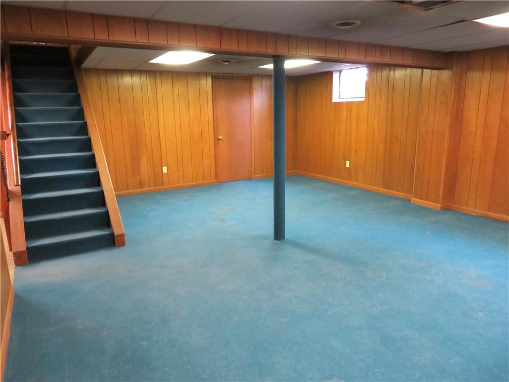 736 Beaver Street Rochester, PA 15074 - Photo 15 of 24 an empty room with wooden floor and windows