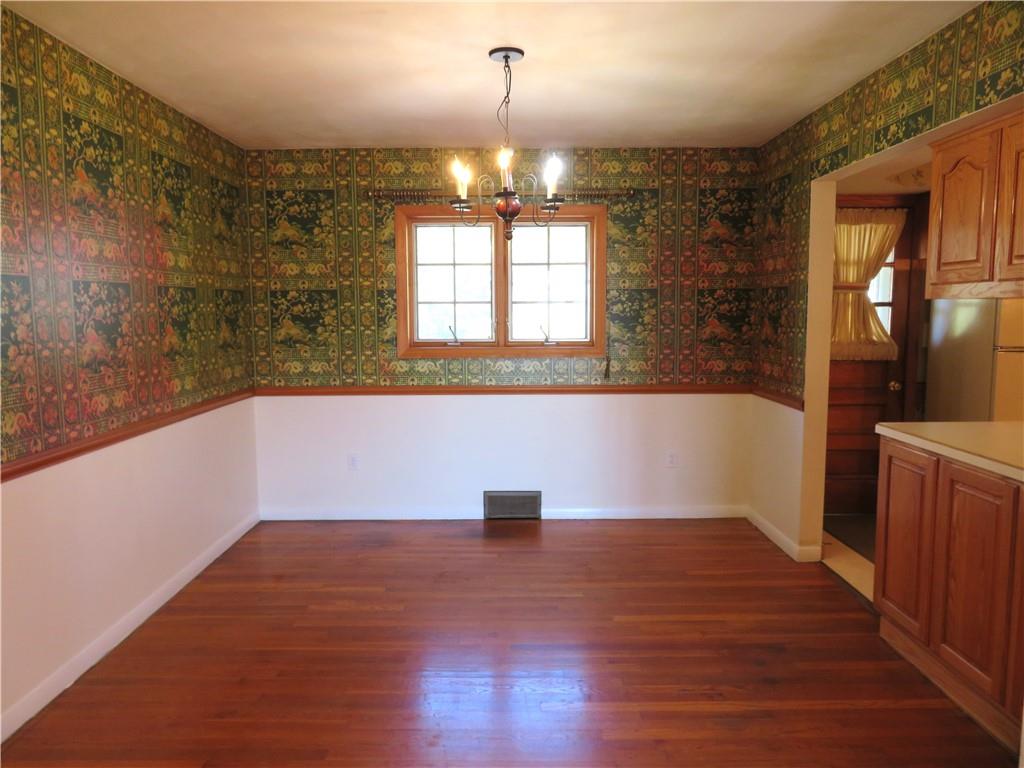 736 Beaver Street Rochester, PA 15074 - Photo 6 of 24 a view of empty room with wooden floor and fan