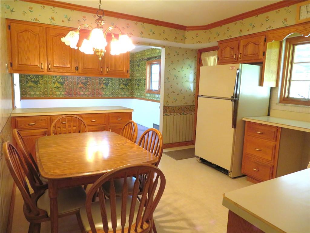 736 Beaver Street Rochester, PA 15074 - Photo 8 of 24 a view of a kitchen with a table and chairs