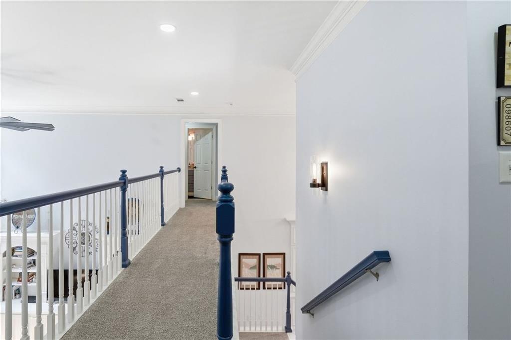 613 Talmadge Lane Canton, GA 30115 - Photo 30 of 84 a view of a hallway with stairs