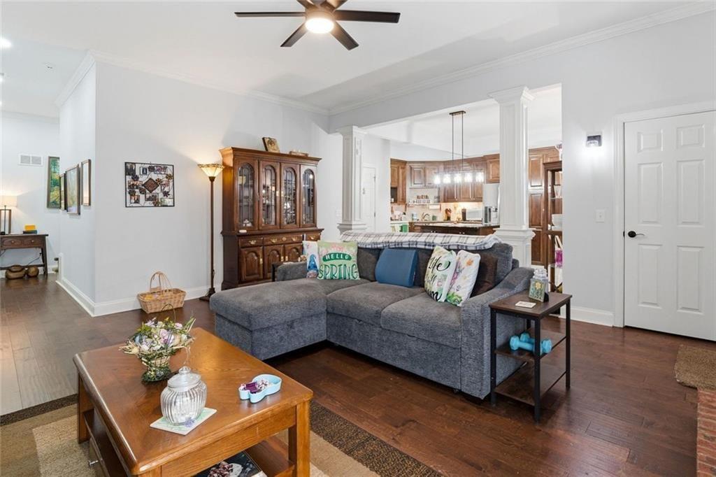 613 Talmadge Lane Canton, GA 30115 - Photo 61 of 84 a living room with furniture and a wooden floor