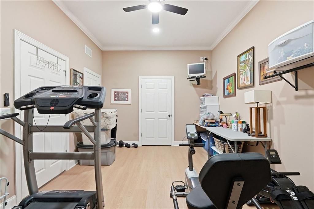613 Talmadge Lane Canton, GA 30115 - Photo 70 of 84 a view of a workspace with furniture and a workspace