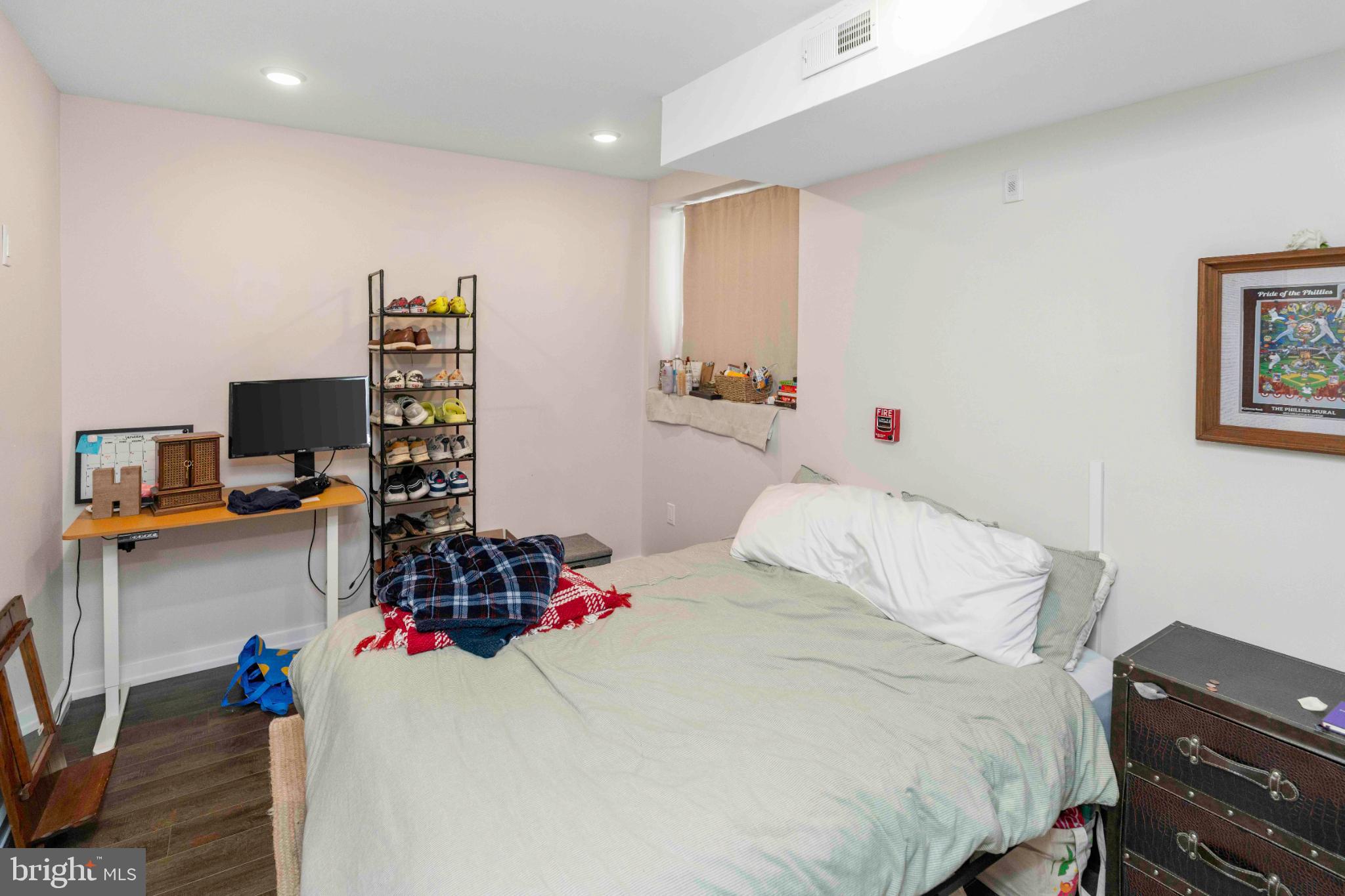 1309 South 20th Street Philadelphia, PA 19146 - Photo 15 of 37 a bedroom with a bed and a desk