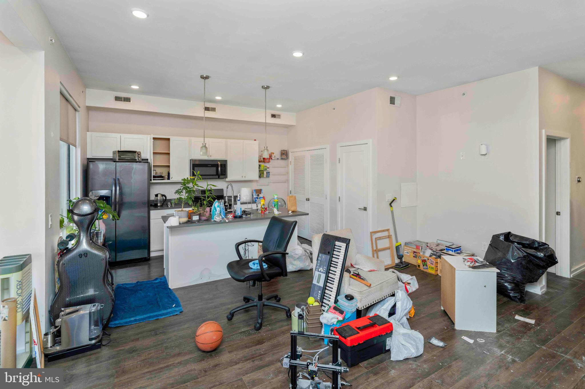 1309 South 20th Street Philadelphia, PA 19146 - Photo 26 of 37 a living room with furniture and a wooden floor