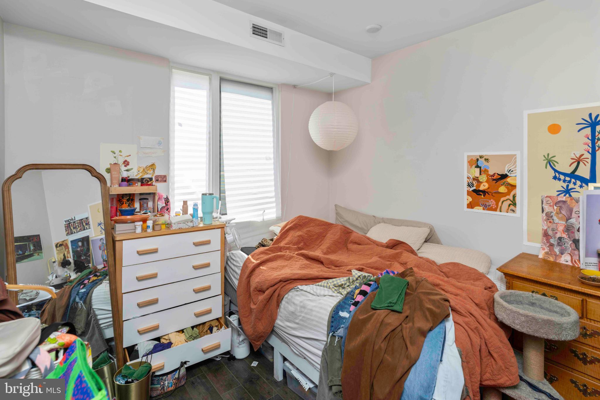 1309 South 20th Street Philadelphia, PA 19146 - Photo 28 of 37 a bedroom with a bed and a window