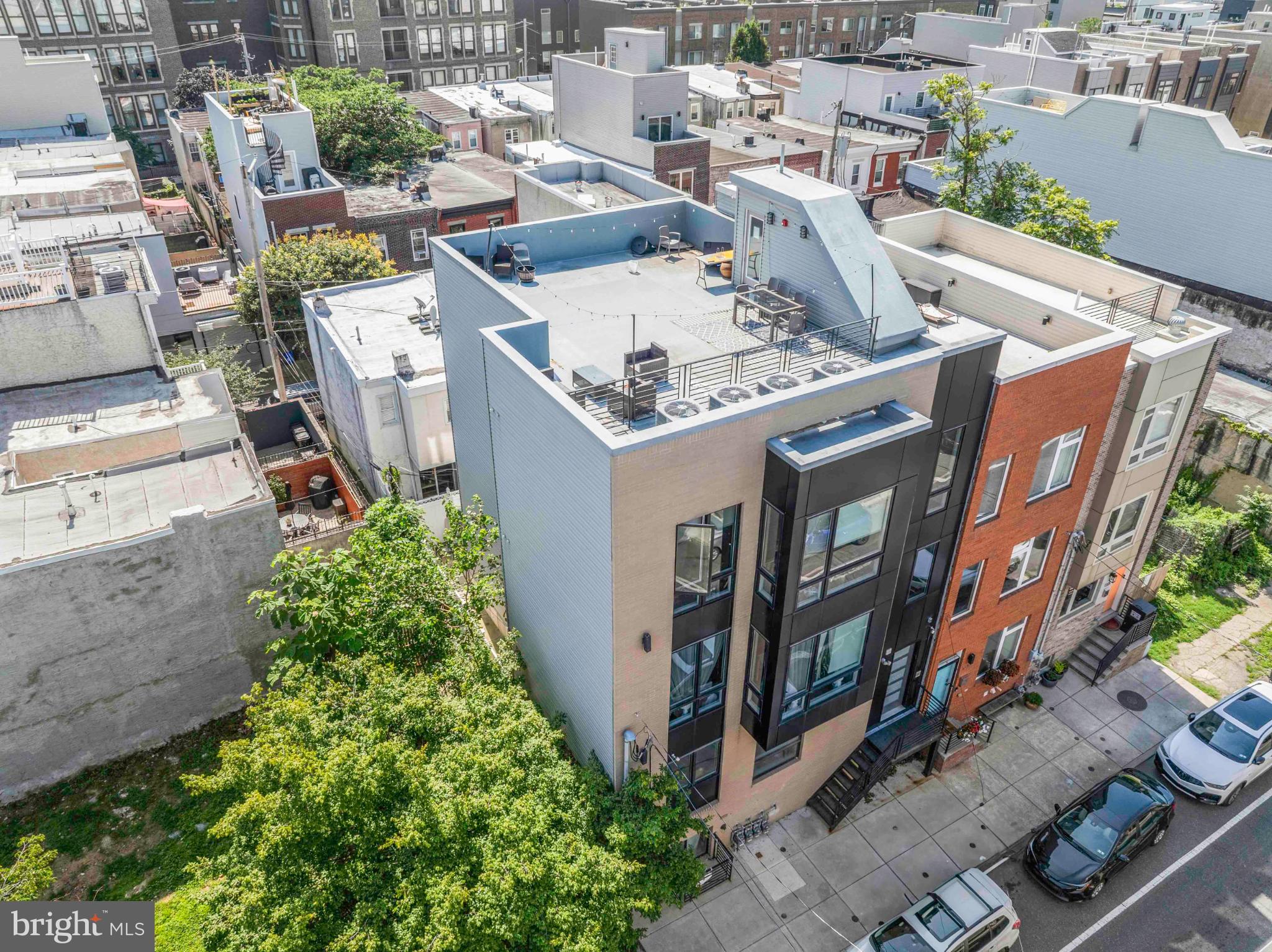 1309 South 20th Street Philadelphia, PA 19146 - Photo 6 of 37 an aerial view of a residential apartment building with a yard