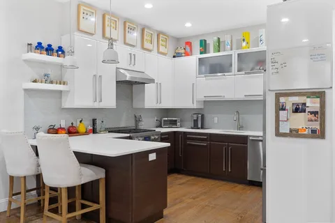 a kitchen with a cabinets and counter space