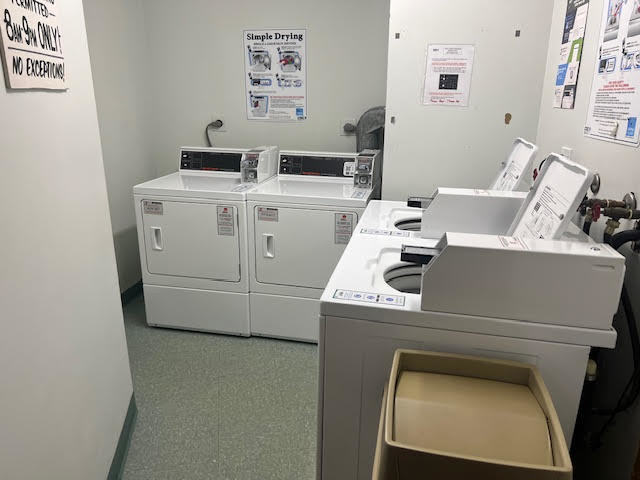 711 South River Road, Unit 511 Des Plaines, IL 60016 - Photo 22 of 23 a utility room with dryer and washer