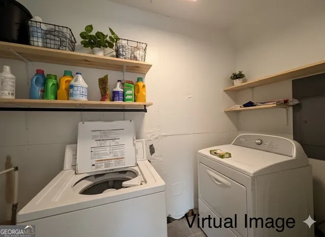 a utility room with dryer and washer