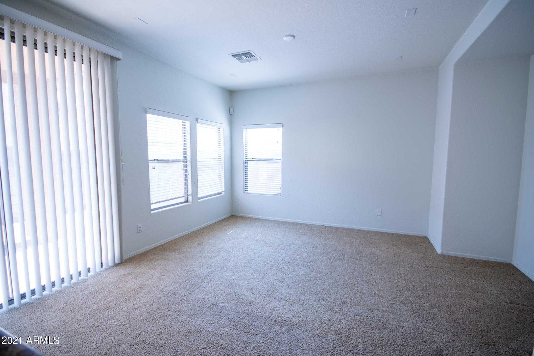 6433 West Harwell Road Laveen, AZ 85339 - Photo 7 of 18 an empty room with windows