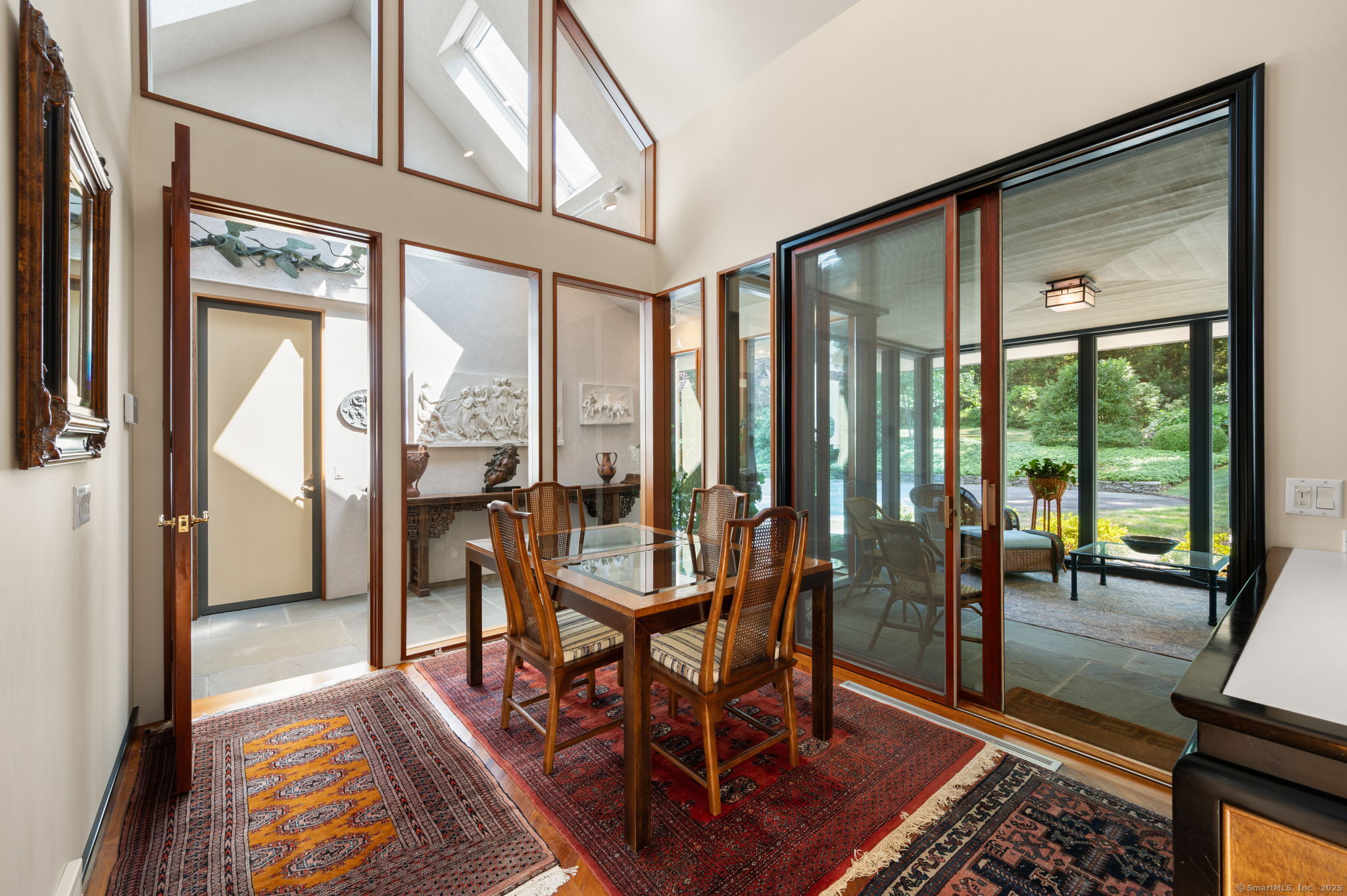 66 Cove Road Lyme, CT 06371 - Photo 14 of 38 a living room with furniture and a large window