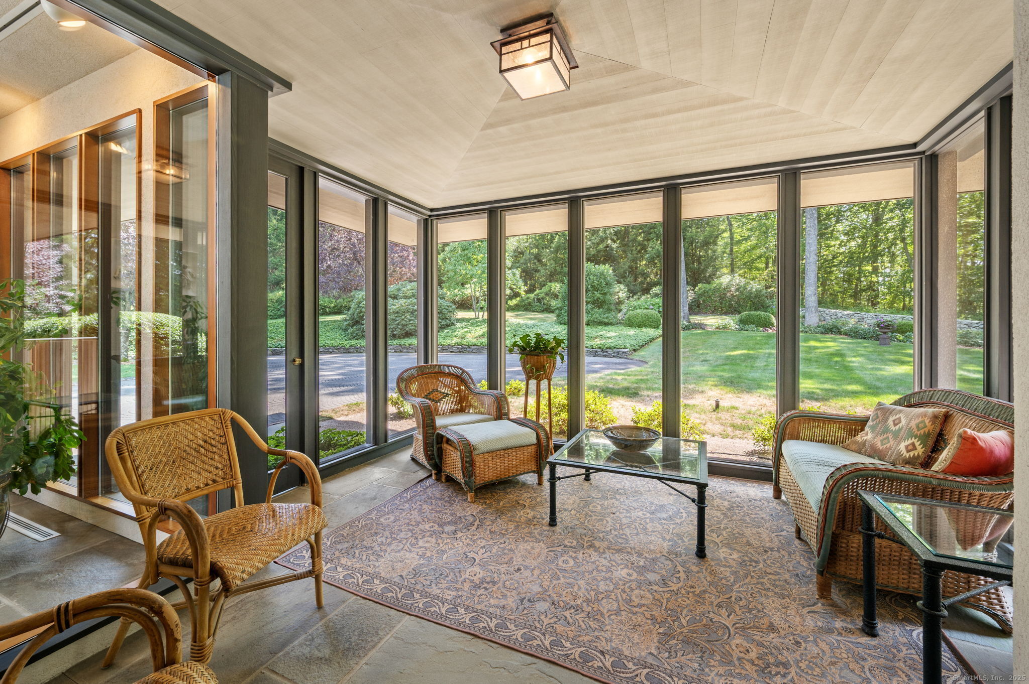 66 Cove Road Lyme, CT 06371 - Photo 15 of 38 a living room with furniture and floor to ceiling windows