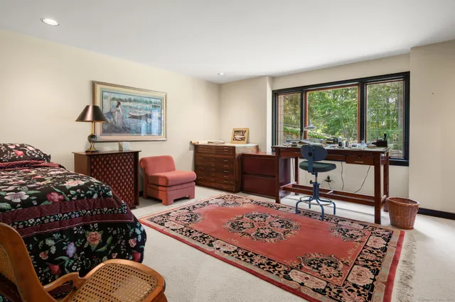 a bed room with a bed and a couch