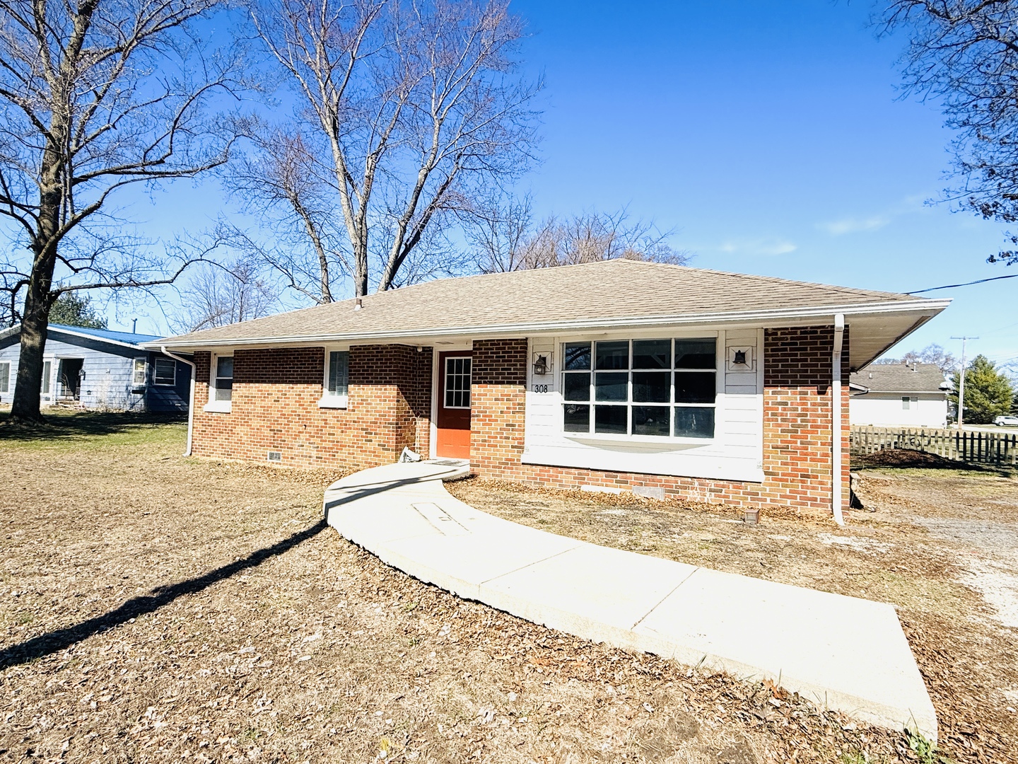 308 Half Street Woodland, IL 60974 - Photo 1 of 1 a front view of a house with a yard and garage