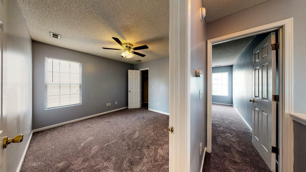 4469 Cardinal Grove Boulevard Raleigh, NC 27616 - Photo 22 of 28 View of Bedroom 3 & Hallway