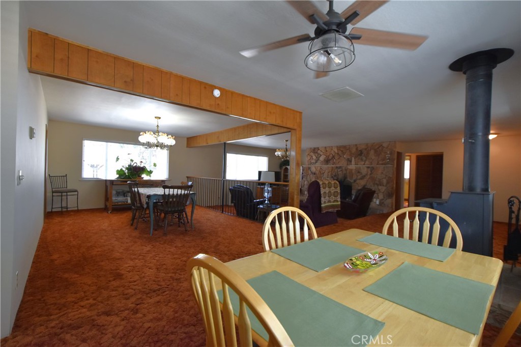 5409 Highway 3 Etna, CA 96027 - Photo 13 of 58 a view of a dining room with furniture and chandelier