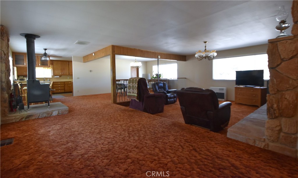5409 Highway 3 Etna, CA 96027 - Photo 17 of 58 a living room with furniture and a flat screen tv