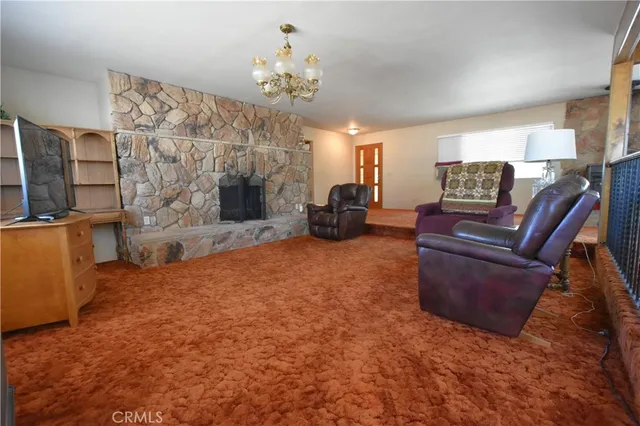 a bedroom with a bed and a mirror