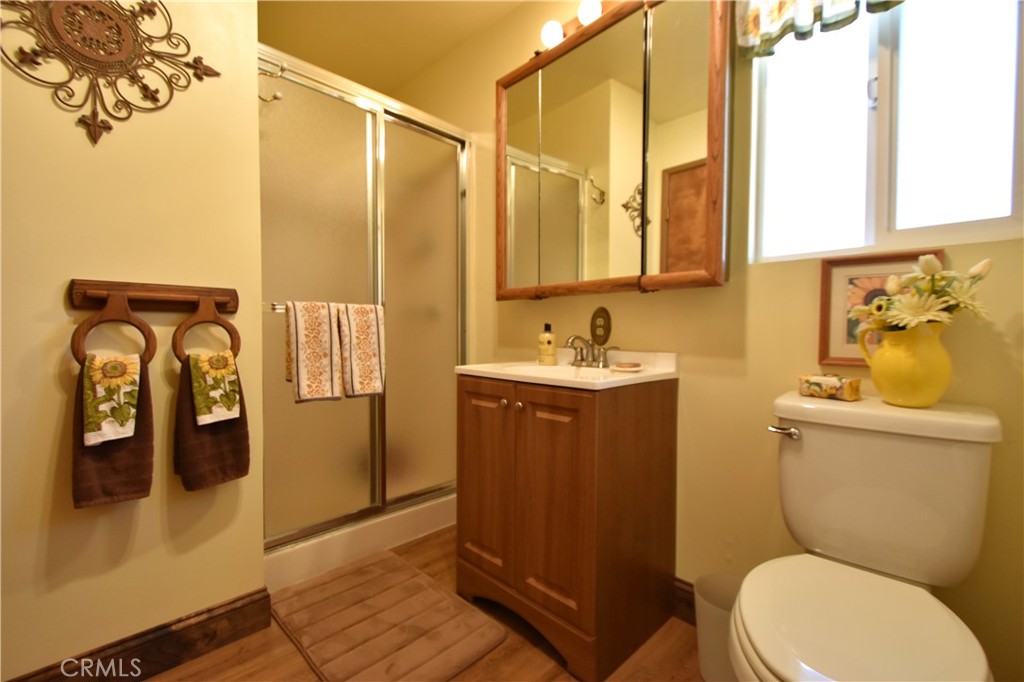 5409 Highway 3 Etna, CA 96027 - Photo 26 of 58 a bathroom with a toilet sink and mirror