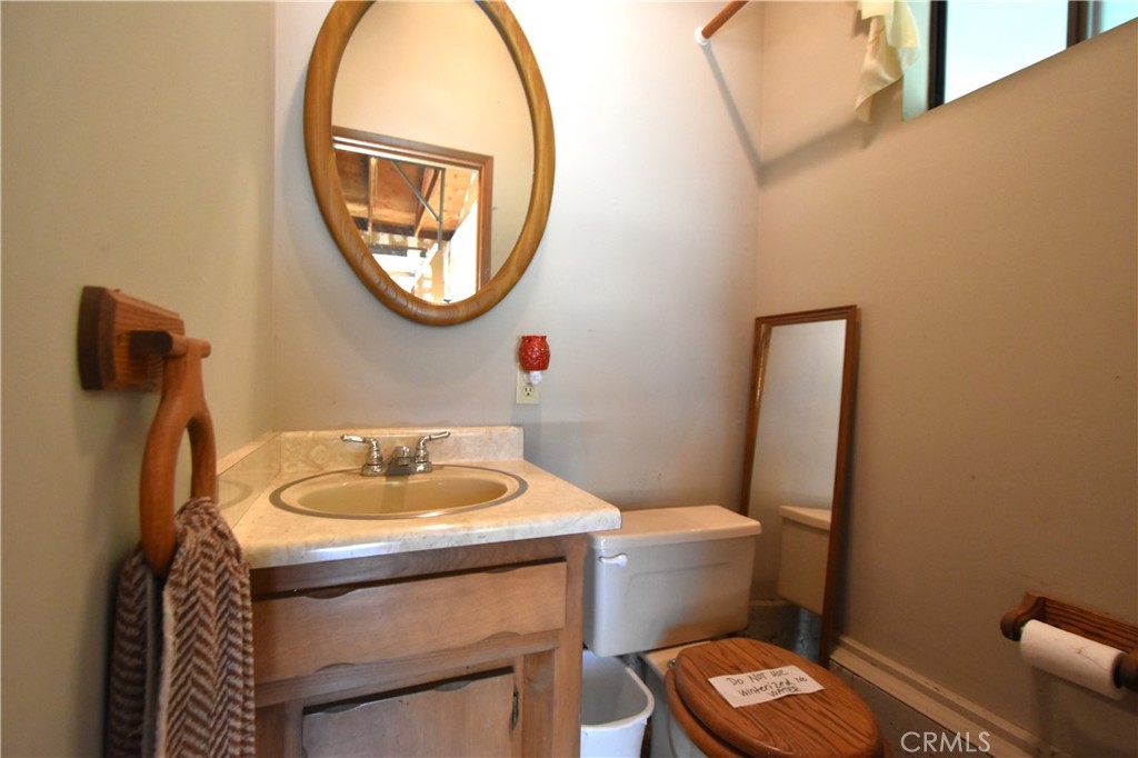 5409 Highway 3 Etna, CA 96027 - Photo 29 of 58 a bathroom with a sink and a mirror