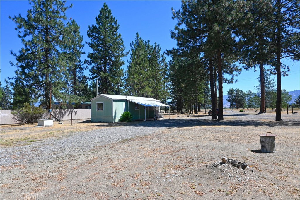 5409 Highway 3 Etna, CA 96027 - Photo 47 of 58 a front view of a house with a yard and garage