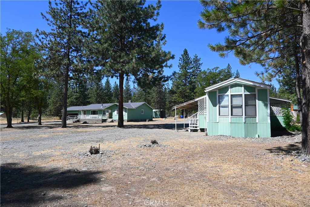 5409 Highway 3 Etna, CA 96027 - Photo 54 of 58 a front view of a house with a yard and garage