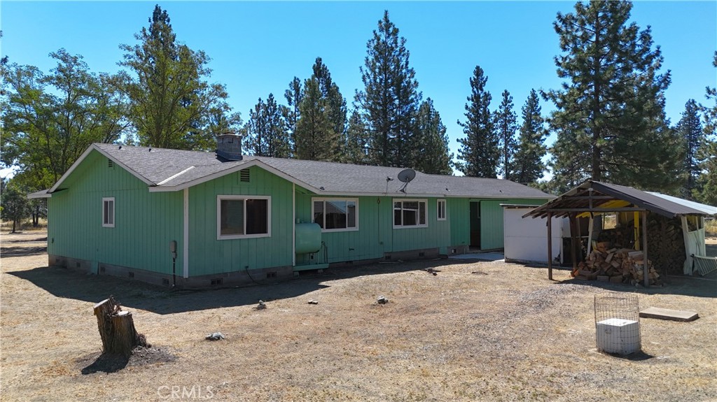 5409 Highway 3 Etna, CA 96027 - Photo 7 of 58 a front view of a house with a yard and garage