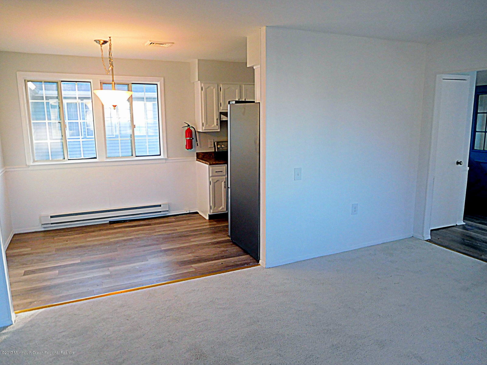 20C Alpine Road, Unit B Whiting, NJ 08759 - Photo 18 of 19 Living room opens to dining area