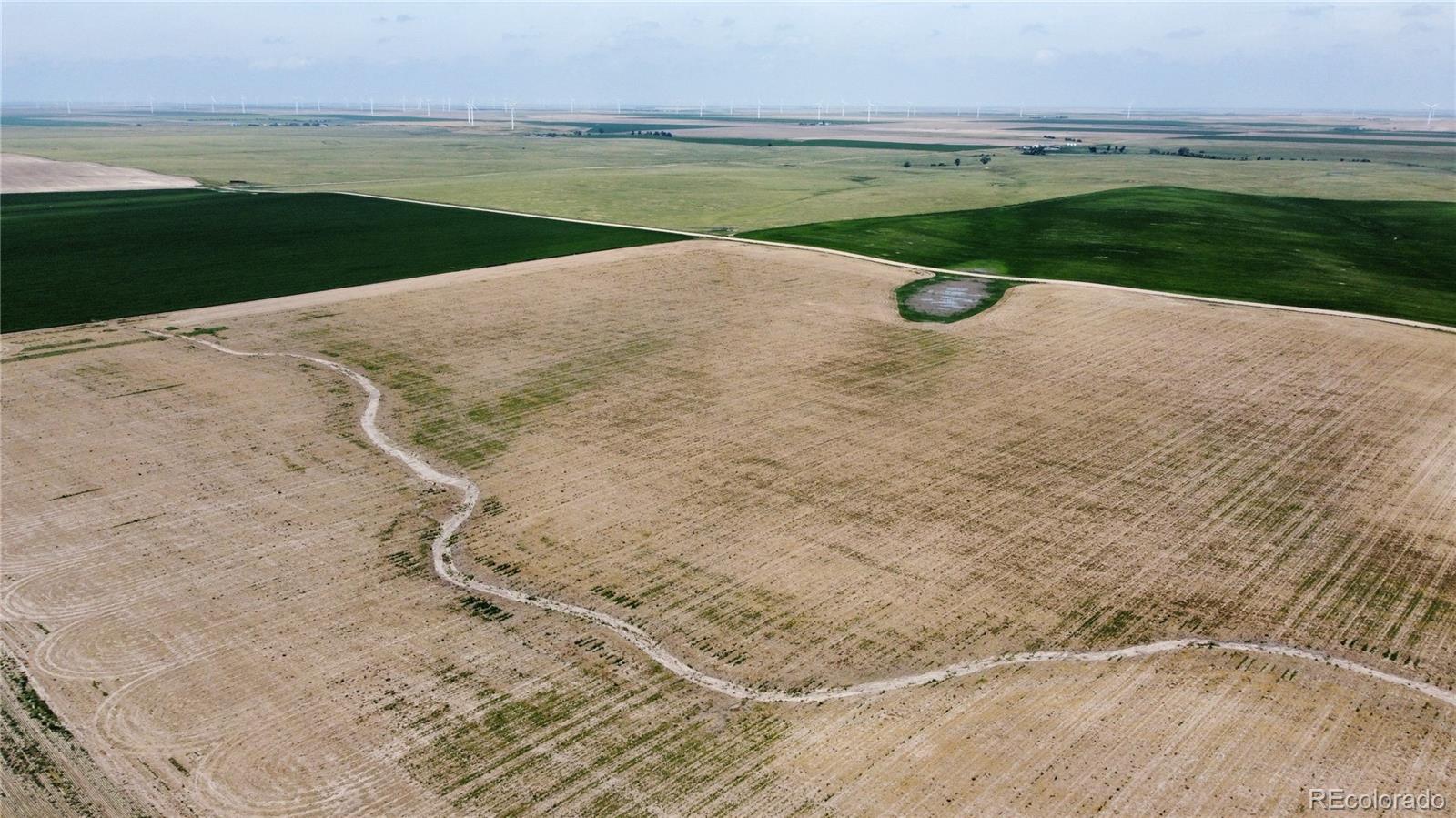 33 County Road Genoa, CO 80818 - Photo 13 of 20 a view of an ocean and a yard