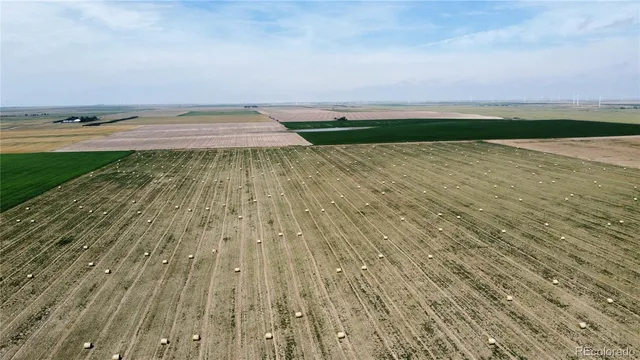 a view of an ocean beach and mountain