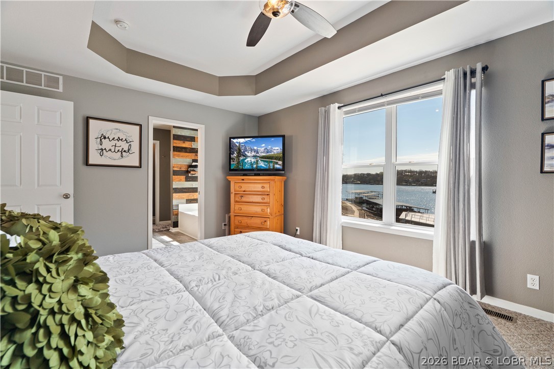 27 Old Sassafrass Road Eldon, MO 65026 - Photo 18 of 71 Enjoy your lake view from the master bedroom