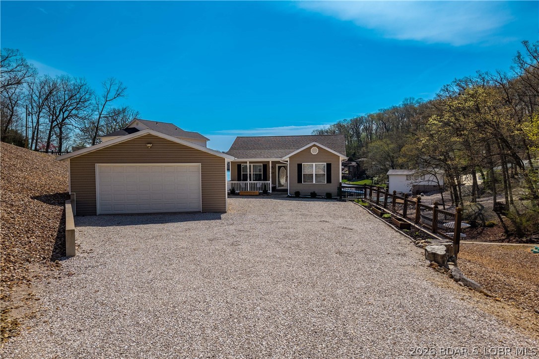 27 Old Sassafrass Road Eldon, MO 65026 - Photo 2 of 71 Oversized garage and tons of parking
