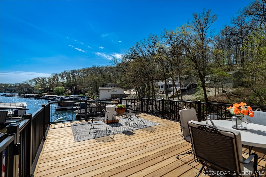 27 Old Sassafrass Road Eldon, MO 65026 - Photo 39 of 71 New deck and railing 2025