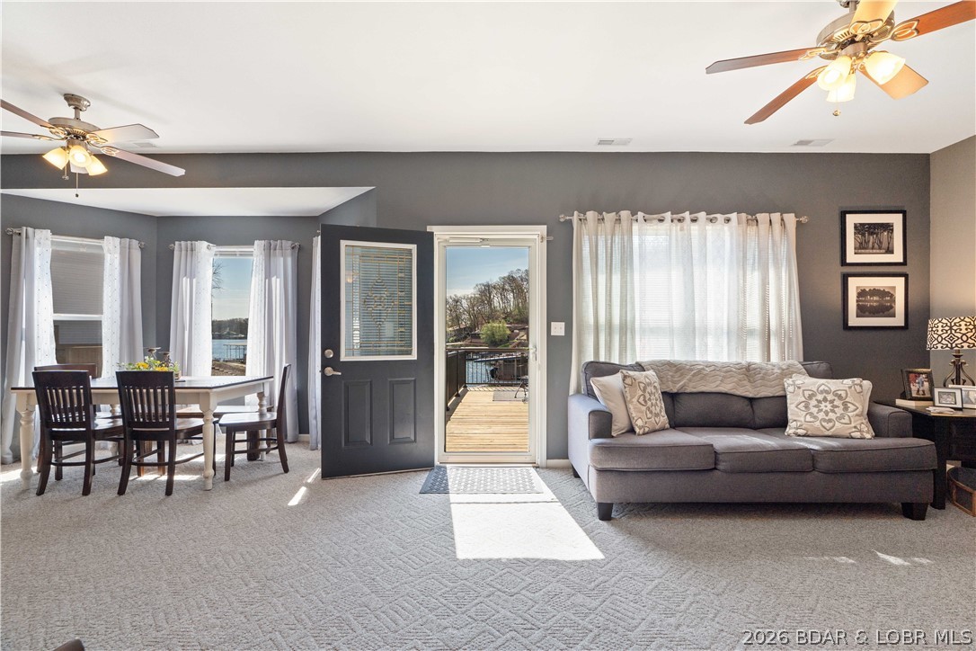 27 Old Sassafrass Road Eldon, MO 65026 - Photo 4 of 71 New storm door to deck 2025