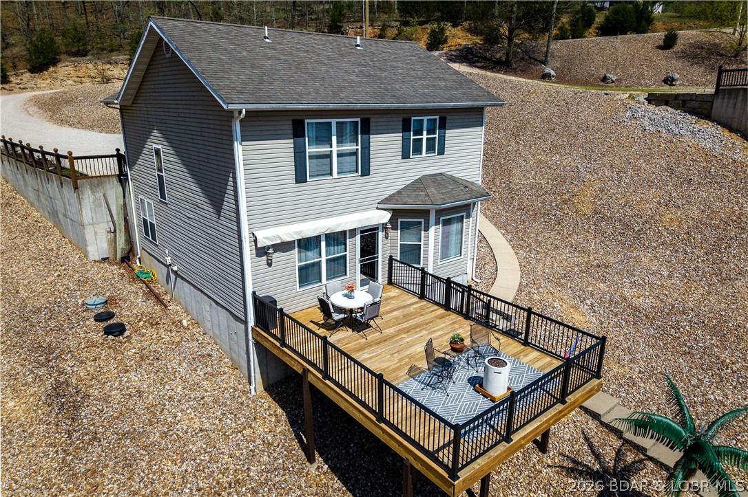 27 Old Sassafrass Road Eldon, MO 65026 - Photo 57 of 71 New deck and railing 2025