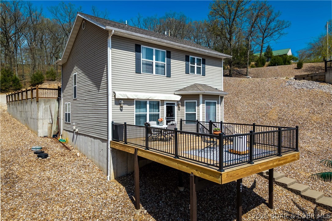 27 Old Sassafrass Road Eldon, MO 65026 - Photo 58 of 71 Retractable awning on deck