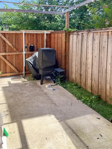 a bedroom with a bed and a mirror